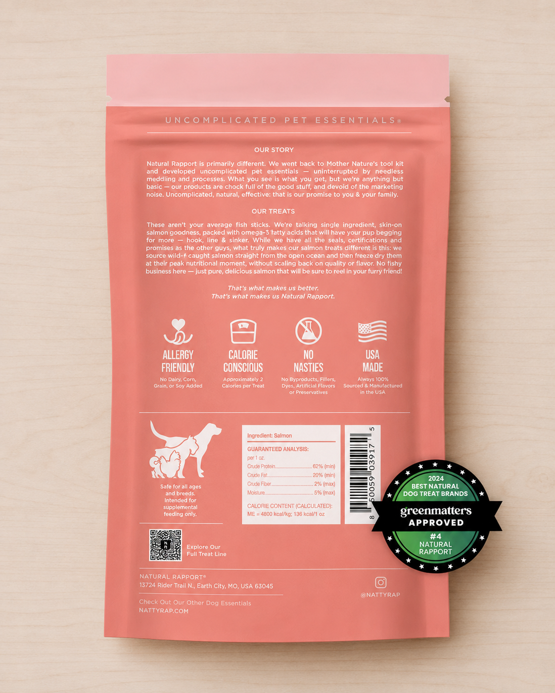 Allgood Freeze Dried dog treats, salmon-pink pet food pouch on a light wood background.
