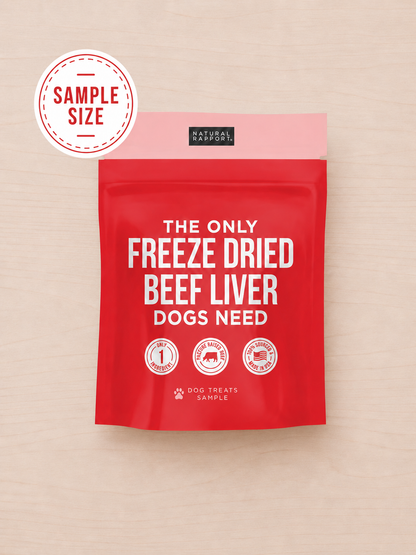 Allgood freeze dried dog treats on a red stand-up pouch on a light wood background.