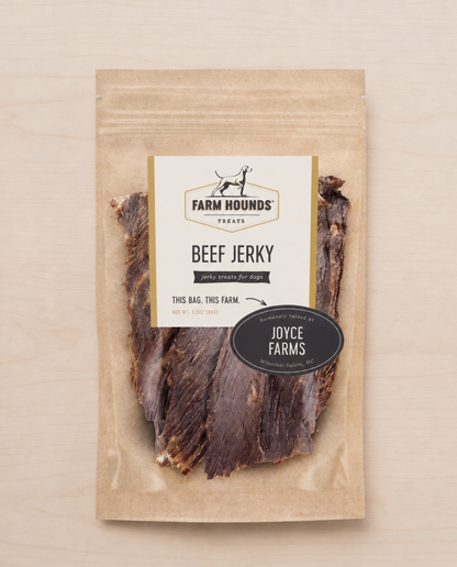 Allgood beef jerky dog treats package on a beige background.