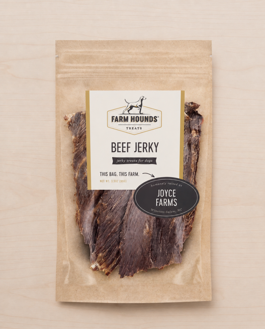 Allgood beef jerky dog treats package on a beige background.